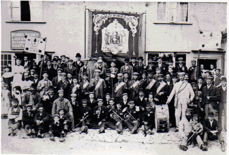 members outside the Queens Head about 1900 with the Hargrave band